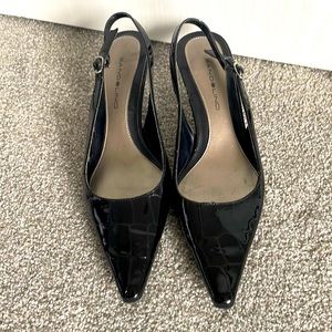 Black, patent leather kitten heels